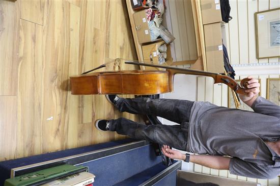 A cello and two bows, cello height 123cm
